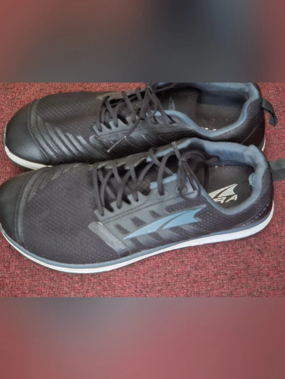Altra Black Sneakers with Light Blue Accent